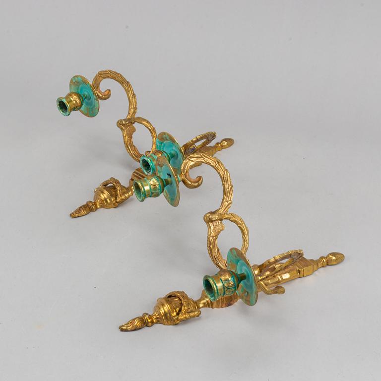 A pair of wall sconces, Louis XVI style, early 20th century.