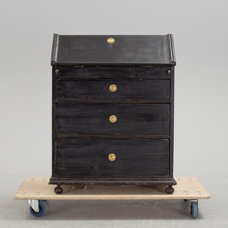 a chest of drawers from the 19th century.