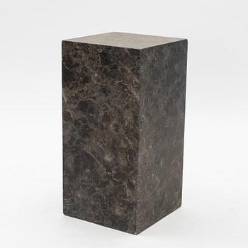 A contemporary pedestal.