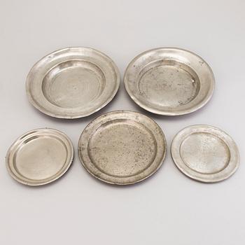 Five pewter dishes, 19th Century.