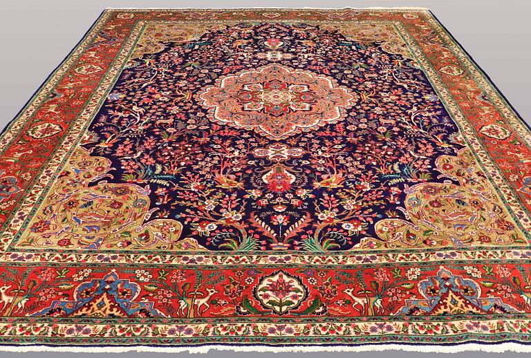 A CARPET, Figural Tabriz, ca 407 x 304 cm.