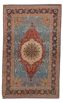 282. A carpet, an old Tabriz, ca 263,5-266 x 165,5-169,5 cm (as well as 1-1,5 cm blue and terracotta striped flat wear).