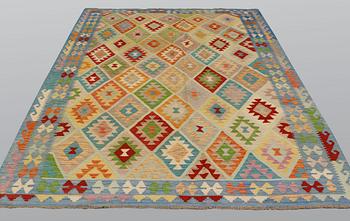 A carpet, kilim, ca 305 x 208 cm.