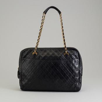 a CHANEL black leather bag.