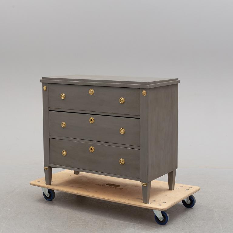 A circa 1900 chest of three drawers.