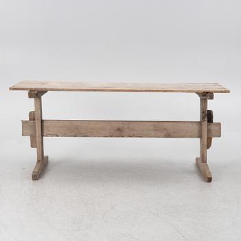 A wooden table, circa 1900.