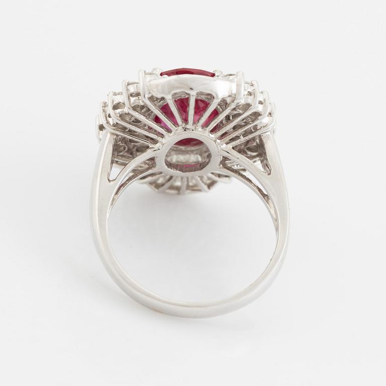 Ruby, baguette- and brilliant cut diamond ring.