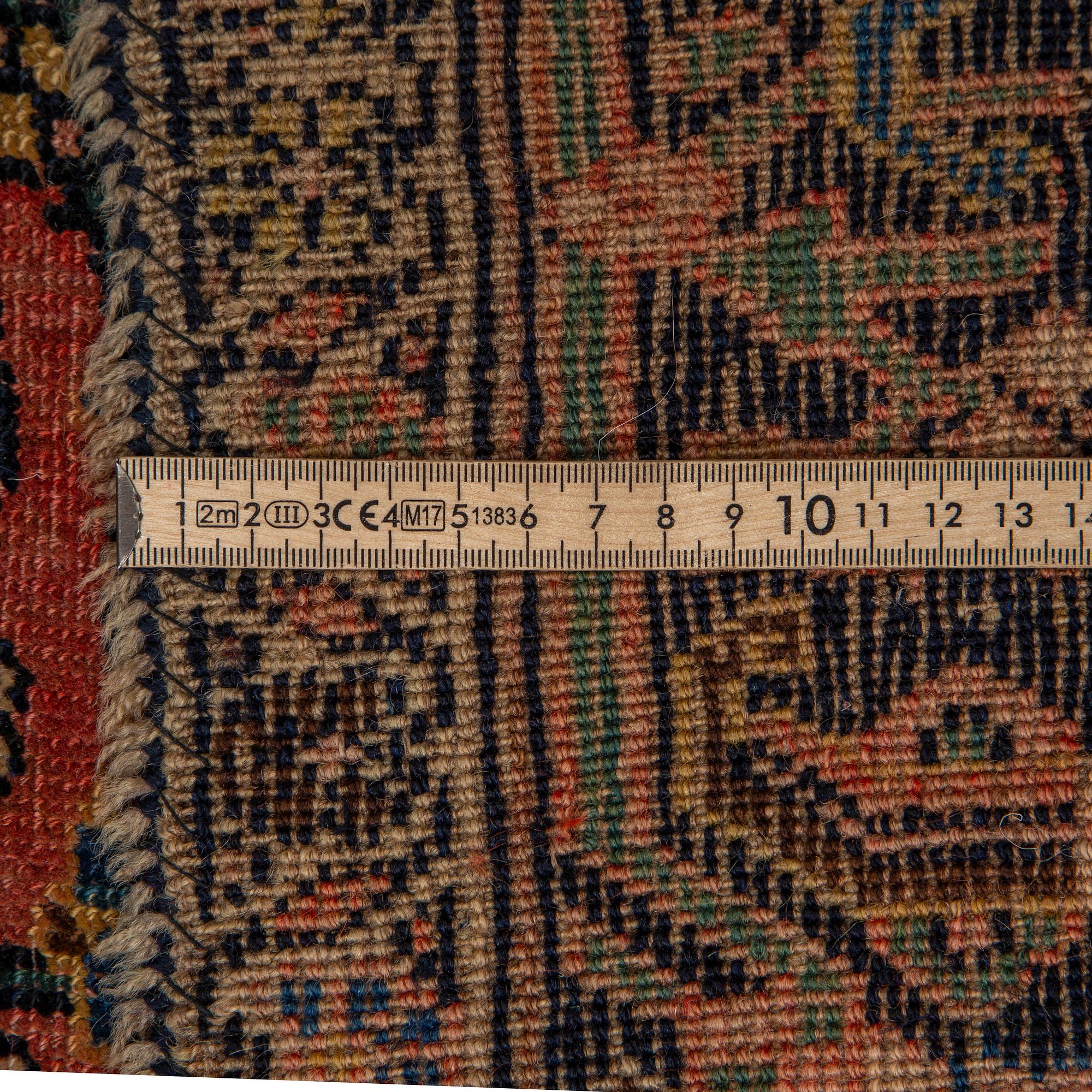 MATTO, an antique Bidjar, ca 220-228 x 138-141 cm.