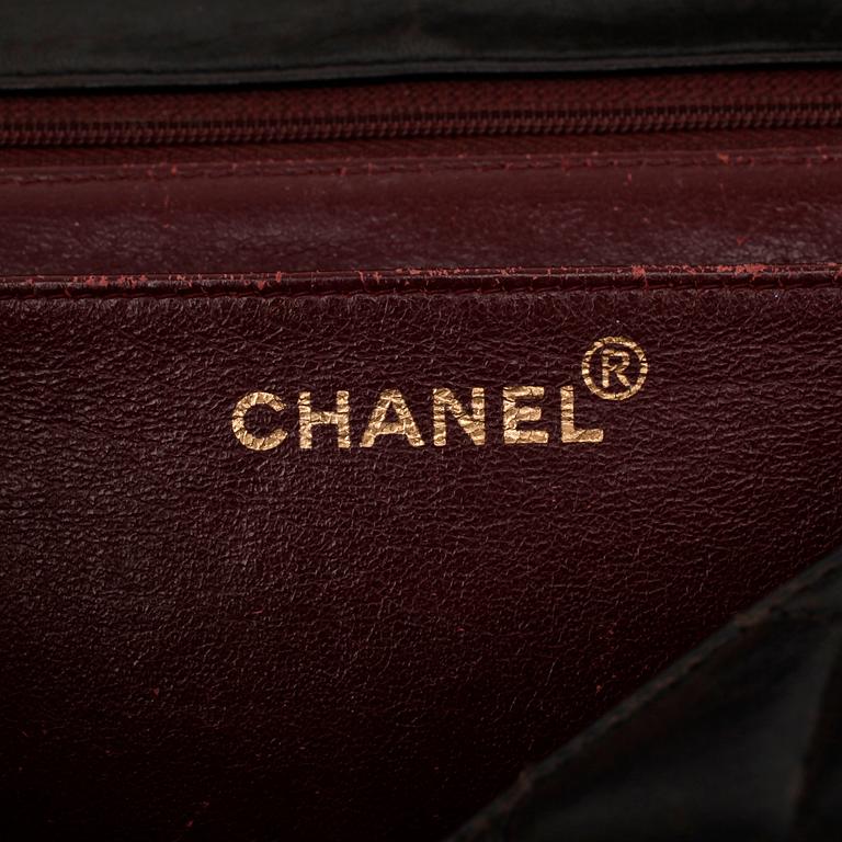 CHANEL, a quilted black leather shoulder bag, "Flap bag".