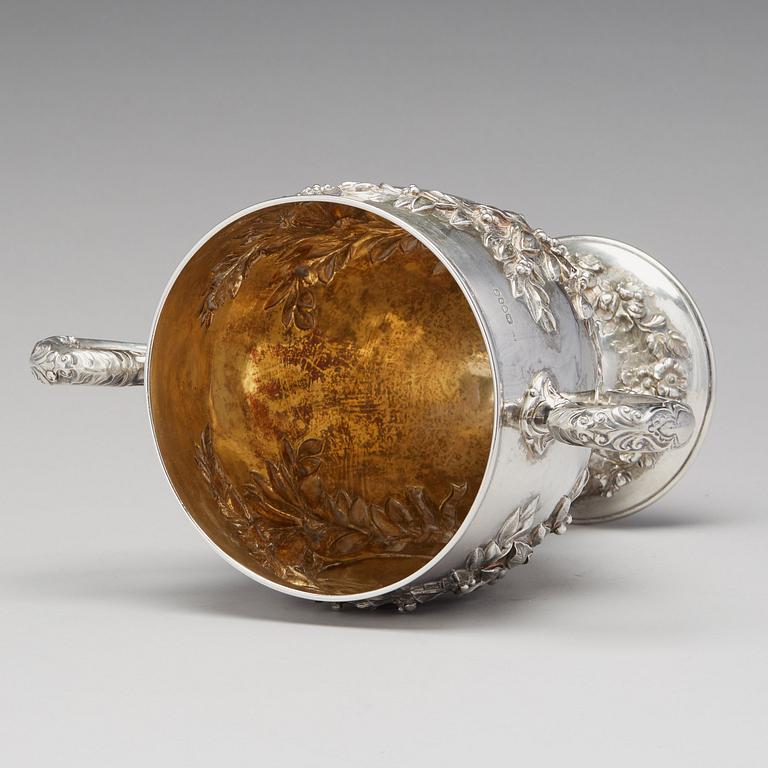 An English 19th century parcel-gilt silver cup, mark of Robert Hennell, London 1863.