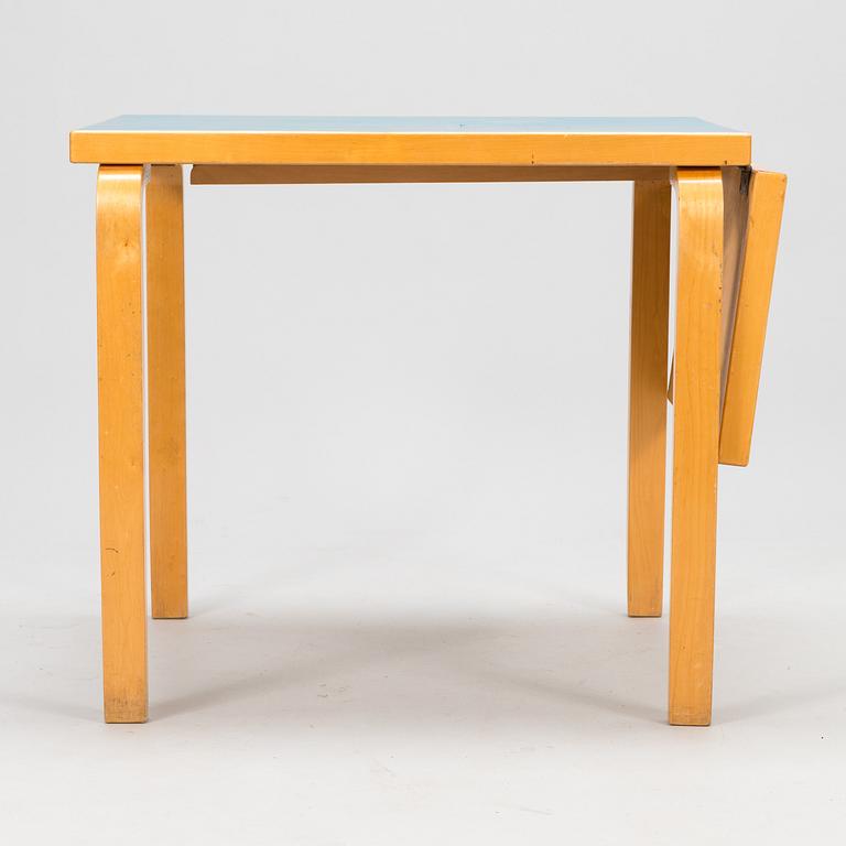 ALVAR AALTO, A mid-20th century drop leaf table for Artek Finland.