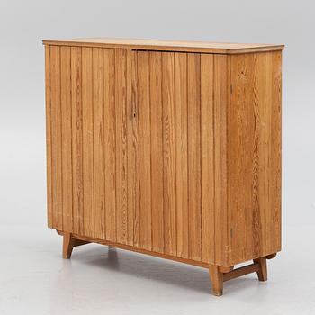 Göran Malmvall, skåp, modell "810", Karl Andersson & Söner, Huskvarna, 1950-tal.