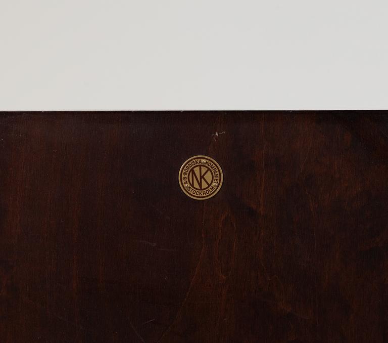 An Axel-Einar Hjorth 'Corall' birch desk by NK, Nordiska Kompaniet 1930's.