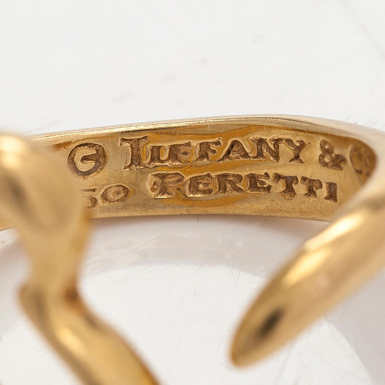 Tiffany & Co, Elsa Peretti, an 18K gold 'Open Heart' ring,.