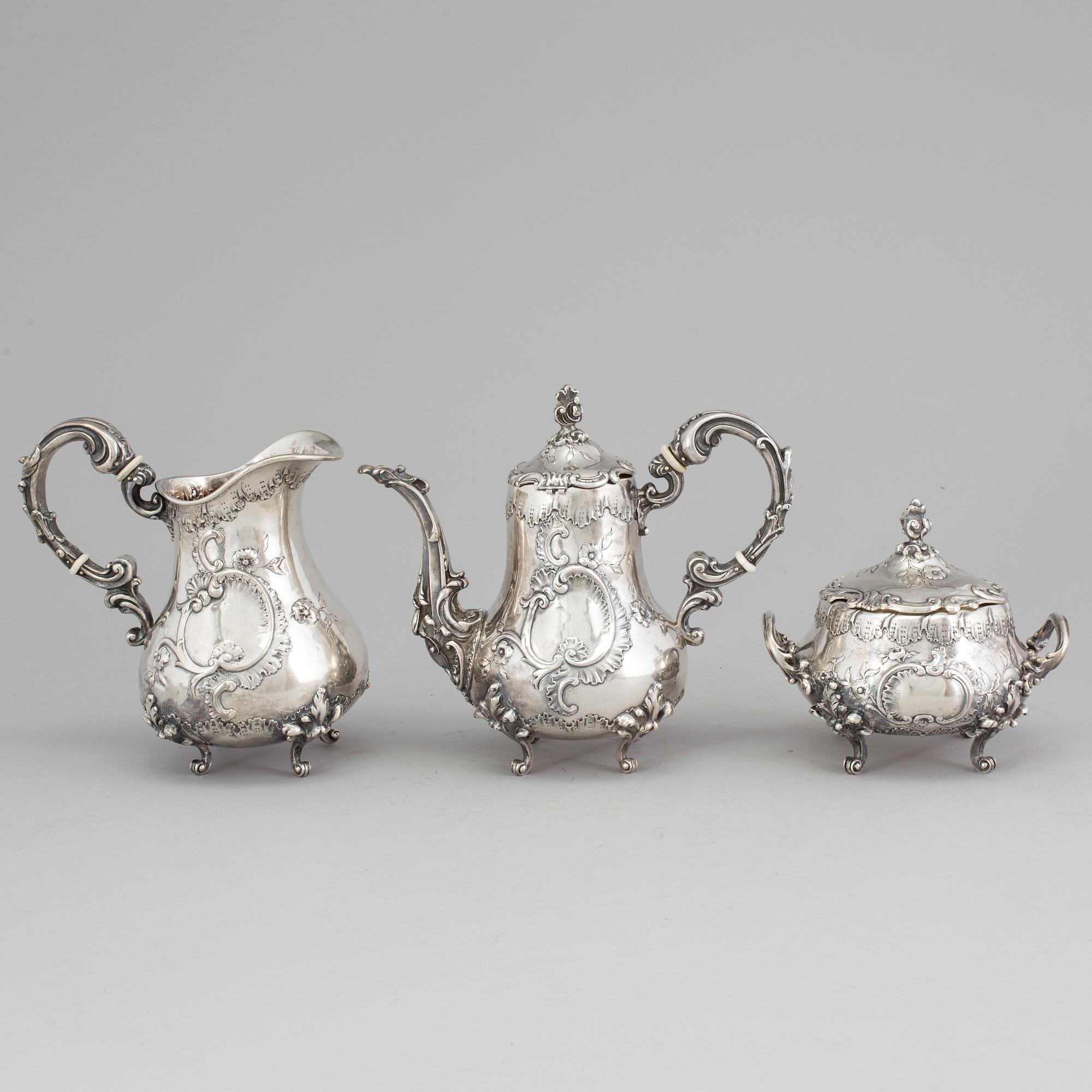 A SILVER COFFEEPOT, SUGARBOWL AND SIMILAR JUG, Hungary-Austria, ca 1900. Weight ca 1327 g.