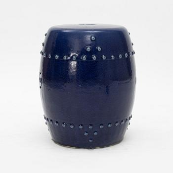 A barrel shaped Chinese blue glazed garden seat, 20th century.