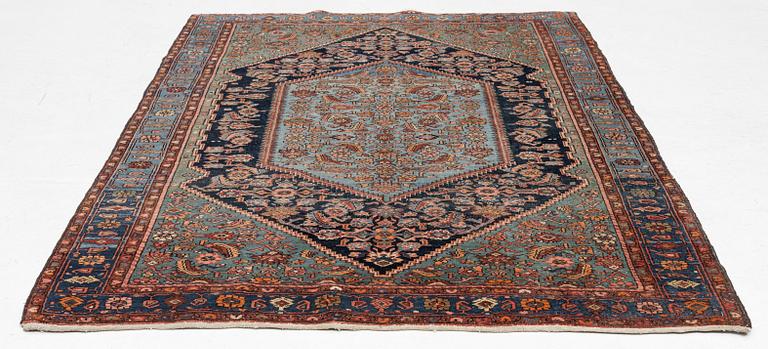 A carpet, semi-antique Hamadan, c. 199 x 128 cm.