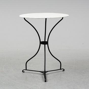 A mid 20th century garden table.