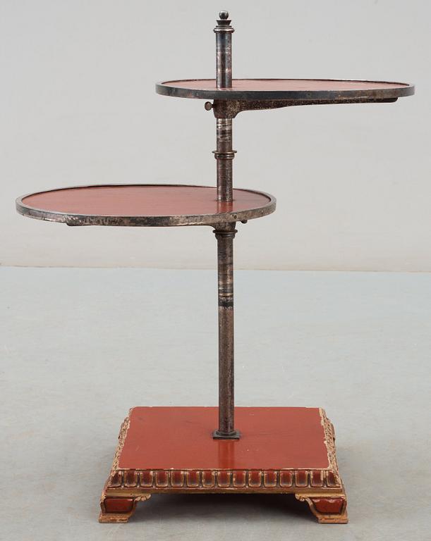 An Axel-Einar Hjorth red lacquer table 'Åbo' on a silver plated brass leg, Nordiska Kompaniet (NK) 1929-30.