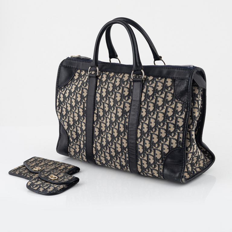 Christian Dior, a handbag, wallet, and coin purse.