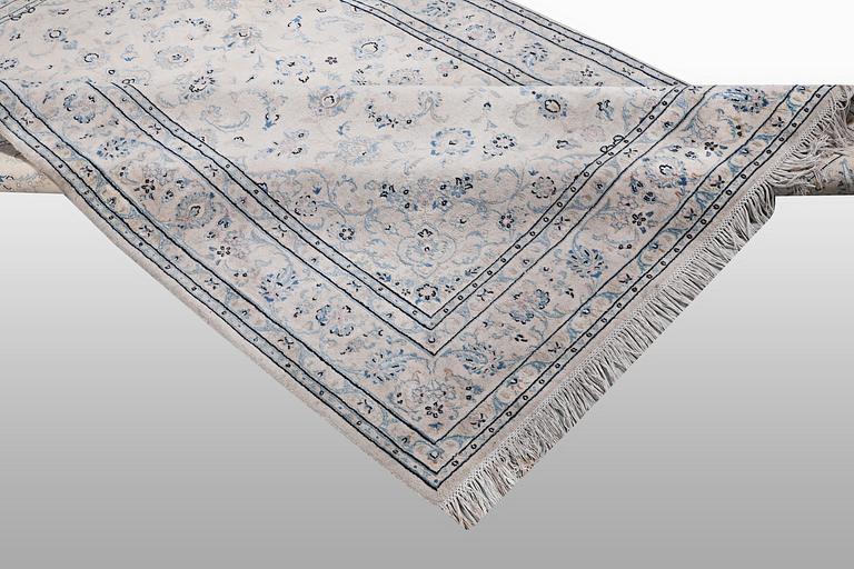 A rug, Nain, part silk, 6 Laa, ca 240 x 165 cm.
