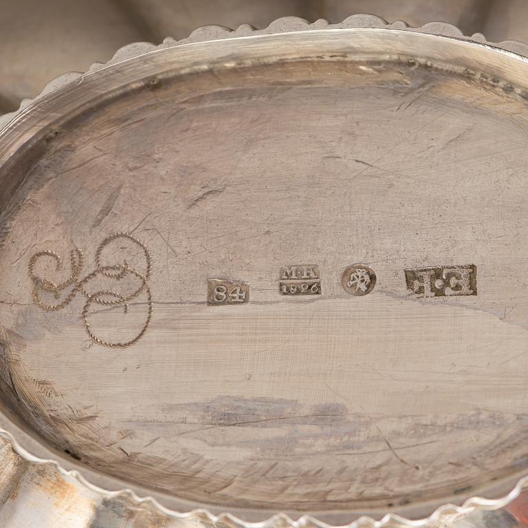 A Russian parcel-gilt cream jug, maker's mark Erik Frisk, St Petersburg, 1826.