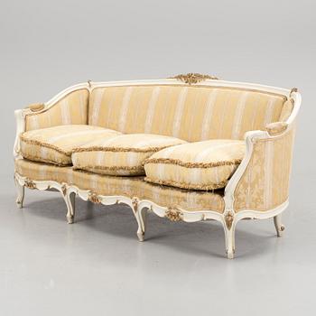 a 1930s rococo style sofa.