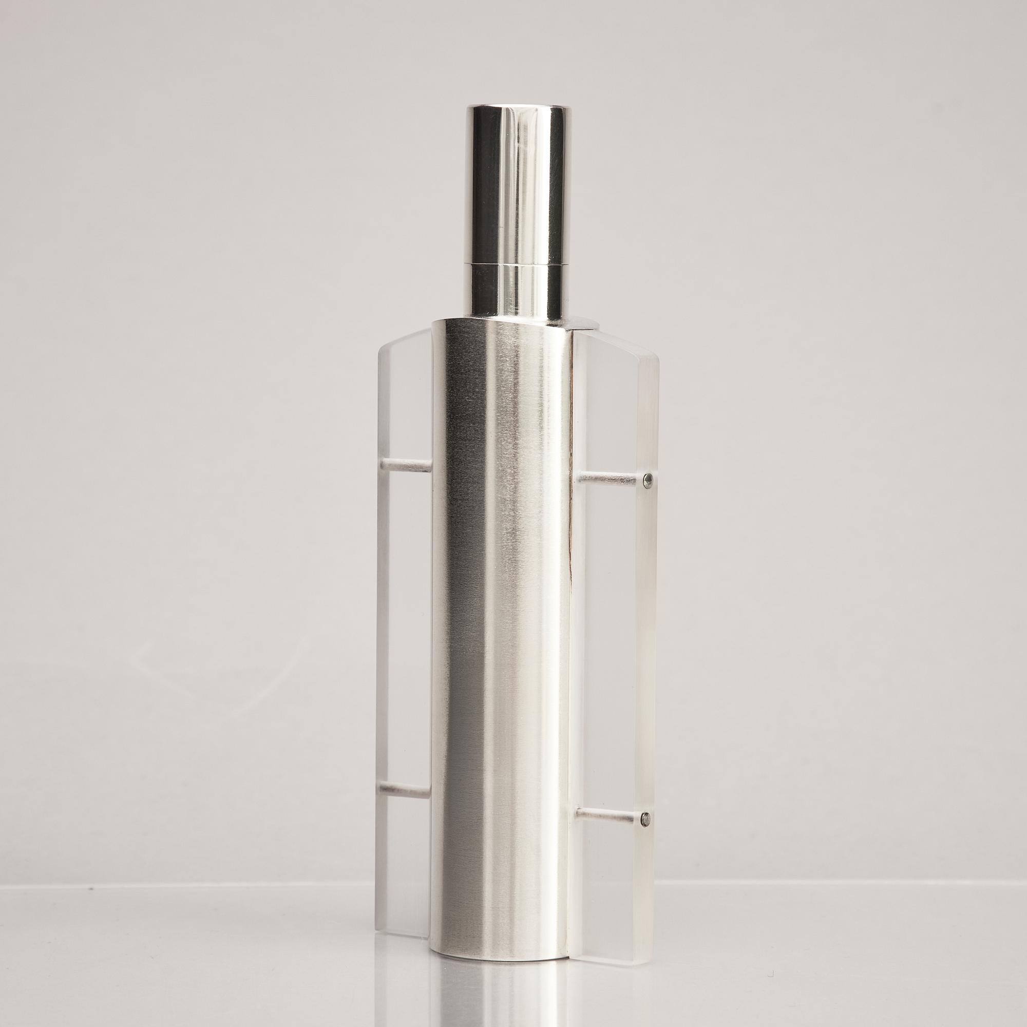 A sterling silver and acrylic bottle with lid, mark of Rolf Lindståhl, Stockholm 2003.