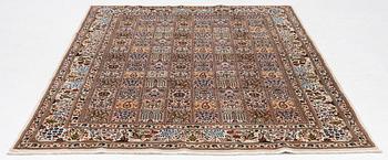 A Moud carpet, part silk, approx. 285 x 195 cm.