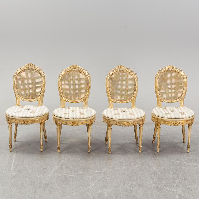 A set of four Louis XVI-style chairs from the early 20th century.