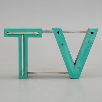 FASADSKYLT. "TV", 1900-talets första hälft.