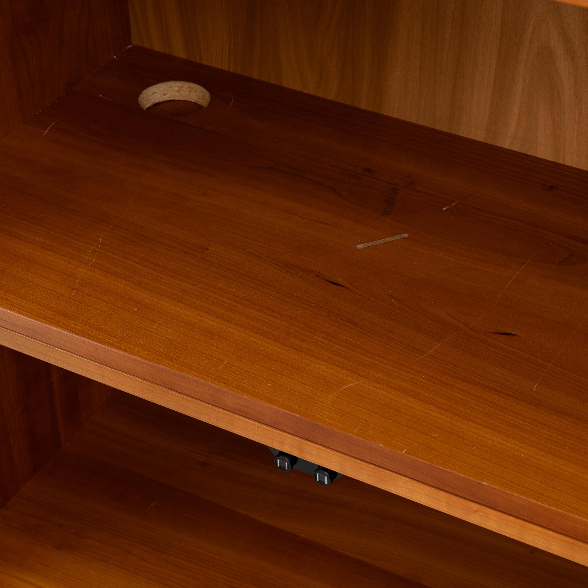 A four section book case, 21st century.