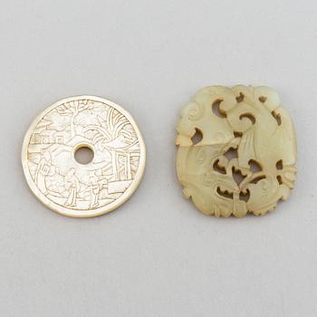 A carved mother of pearl placque and a nephrite placque, China, late Qingdynasty.