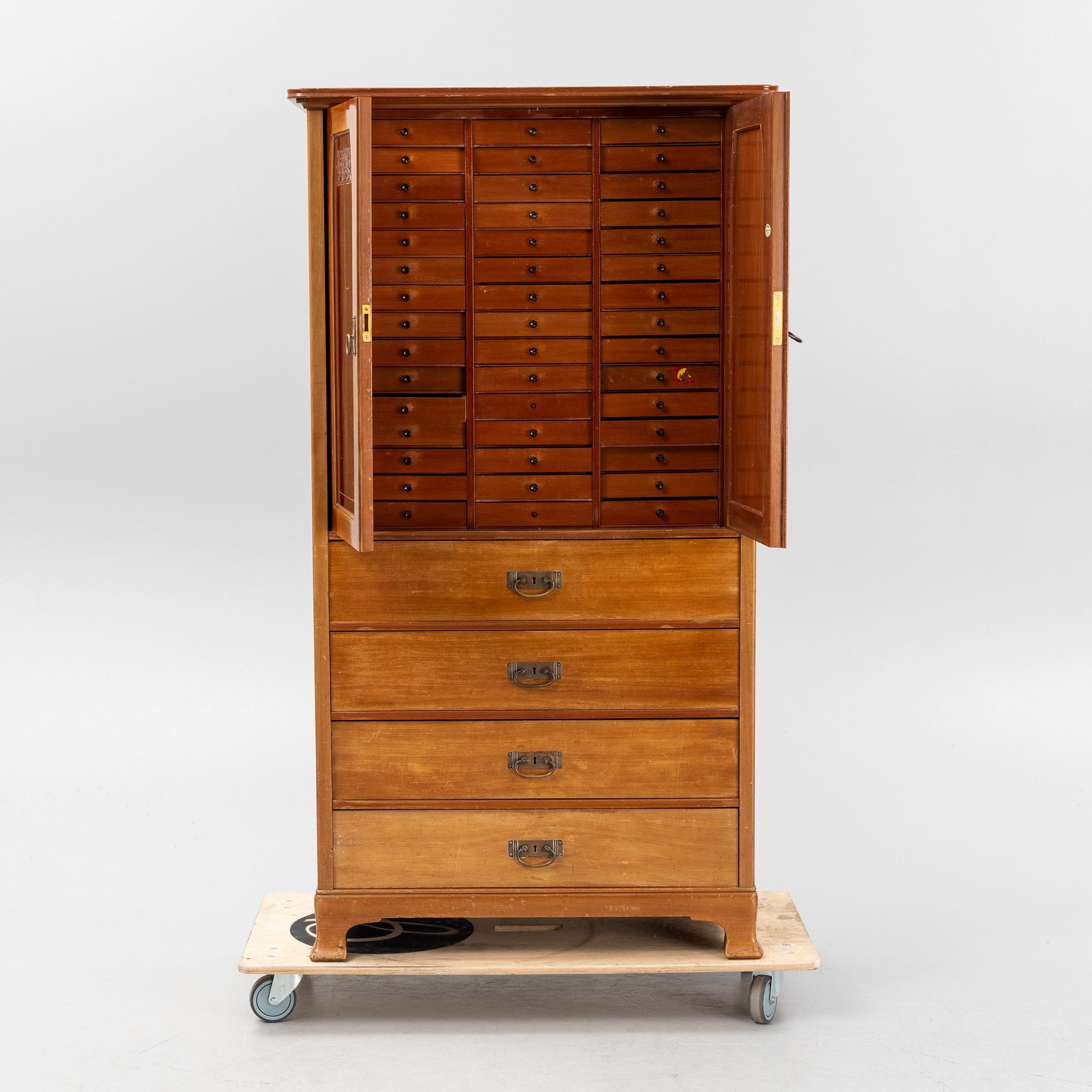 A mahogny veneered art noveau archive cabinet, early 20th Century.