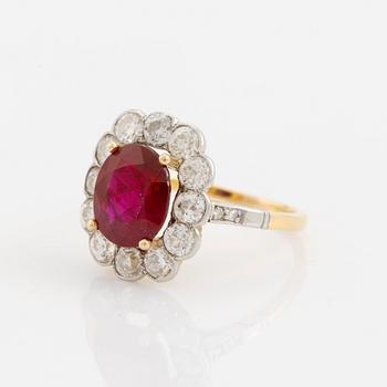 An 18K gold and platinum ring set with a faceted ruby weight ca 3.35 cts.