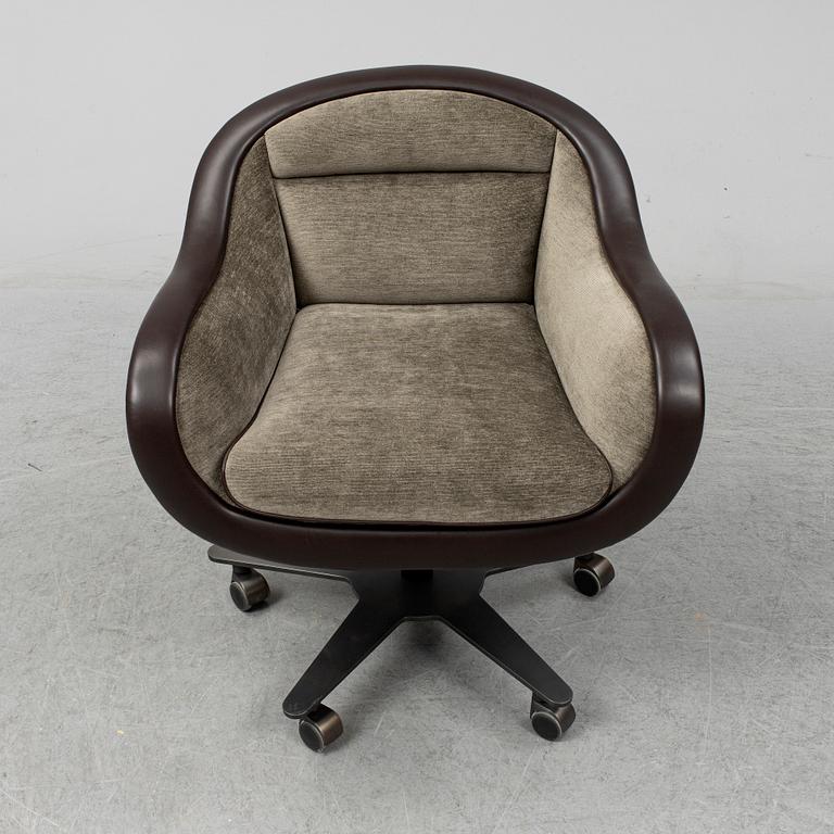 An contemporary 'Vittoria' office chair by Romeo Sozzi for Promemoria furniture.