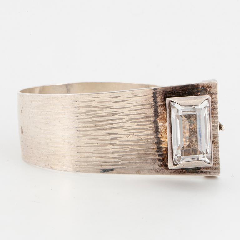 Silver and rock crystal bangle by Martin Öhman.