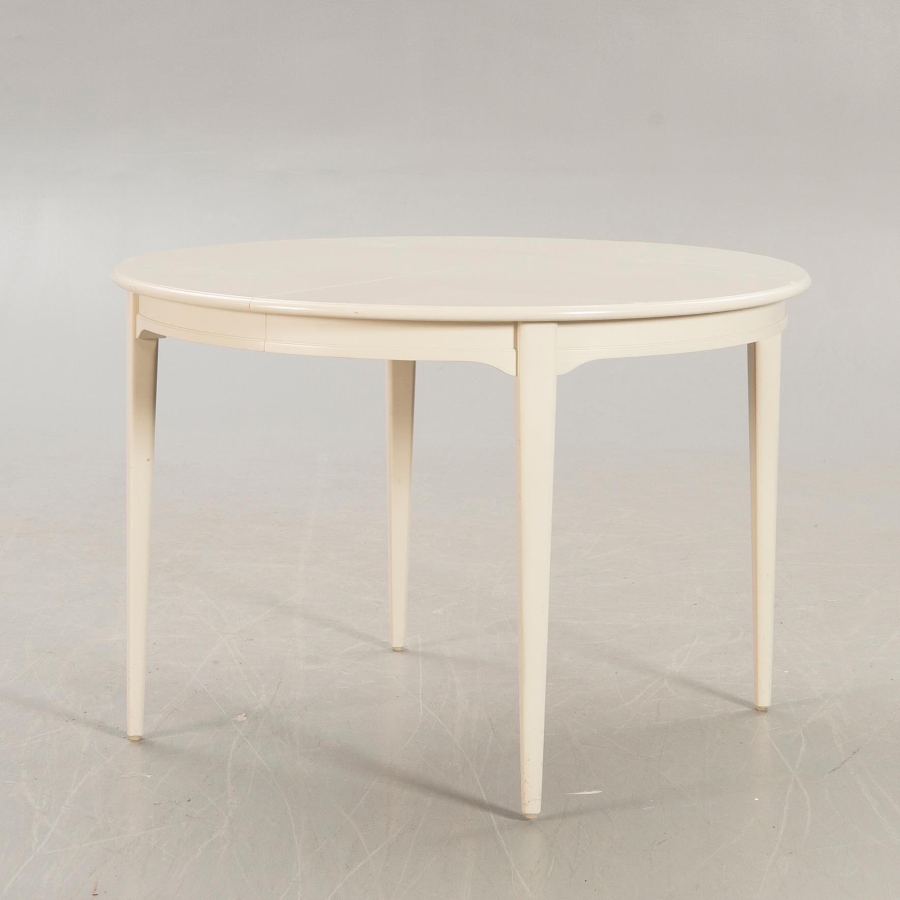 Svante Skogh, dining table plus 2 extension leaves, 4 chairs, second half of the 20th century.