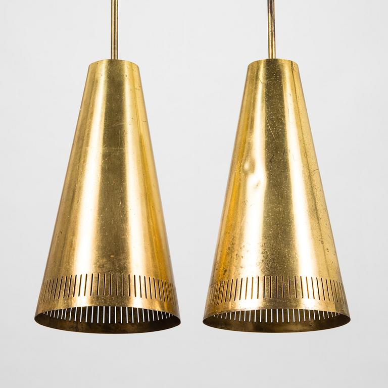 Paavo Tynell, a pair of 1953 pendant lights for Taito.