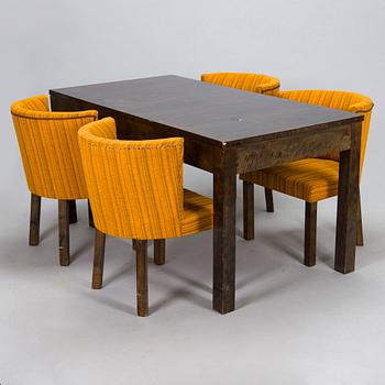 A Finnish 1930s dining table and eight chairs.