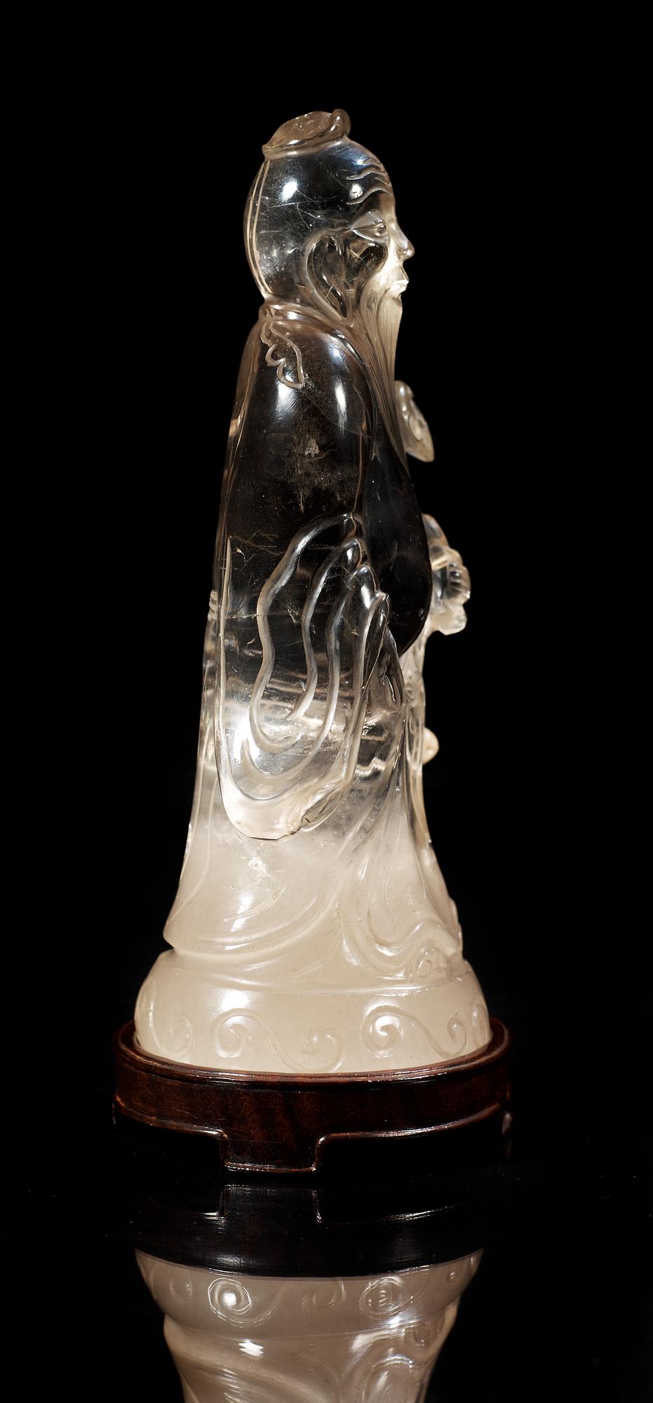 A rock chrystal figure of Shoulau, late Qing dynasty.