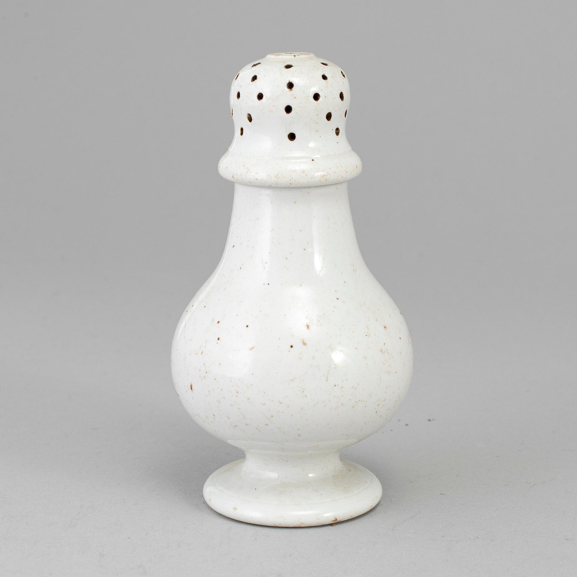 An 18th century fayence shaker.