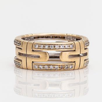 Bulgari, an 18K gold 'Parentesi' ring with diamonds, ca 0.25 ct in total.