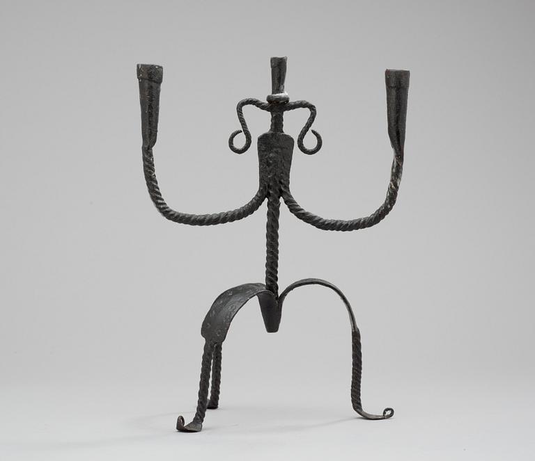 A Swedish iron candelabra, 18/19th century.
