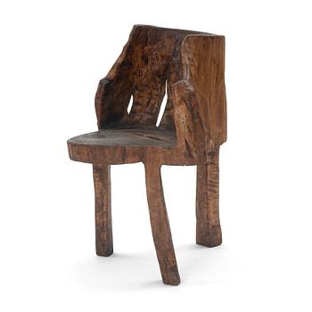 142. A one piece carved armchair, Sweden early 20th century.