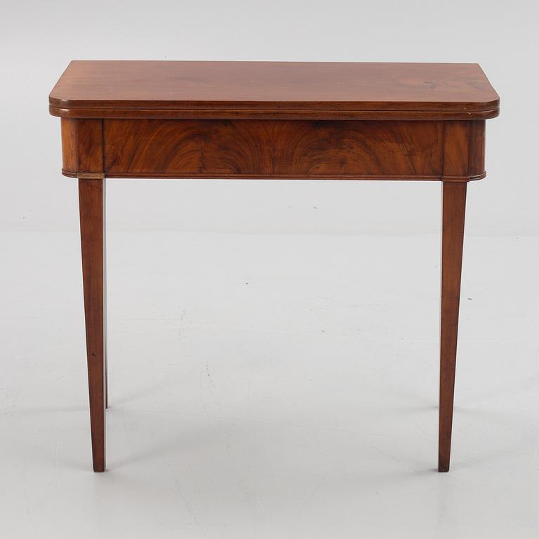 A mahogany games table, second half of the 19th Century.