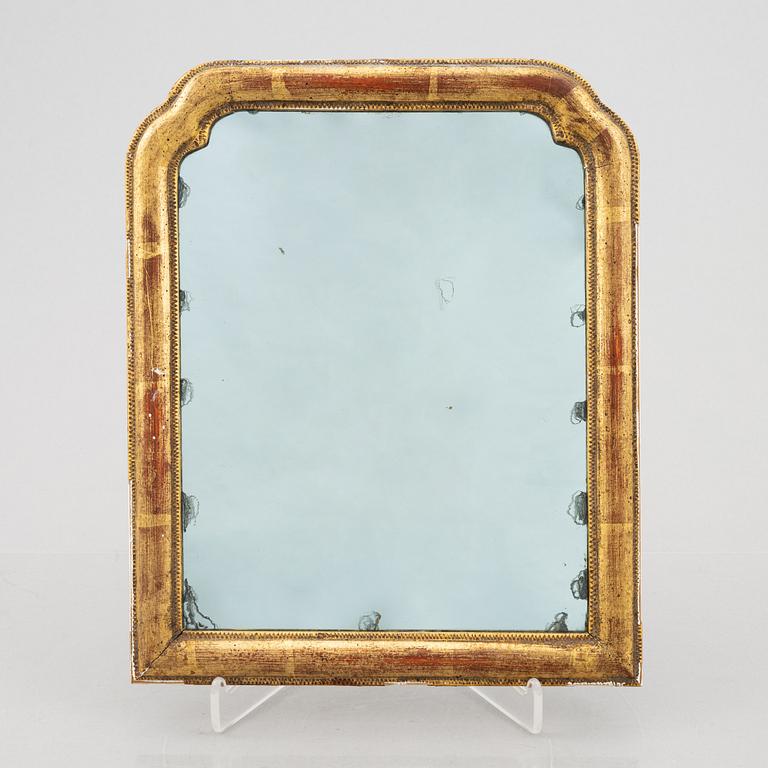 A 18th century mirror,.