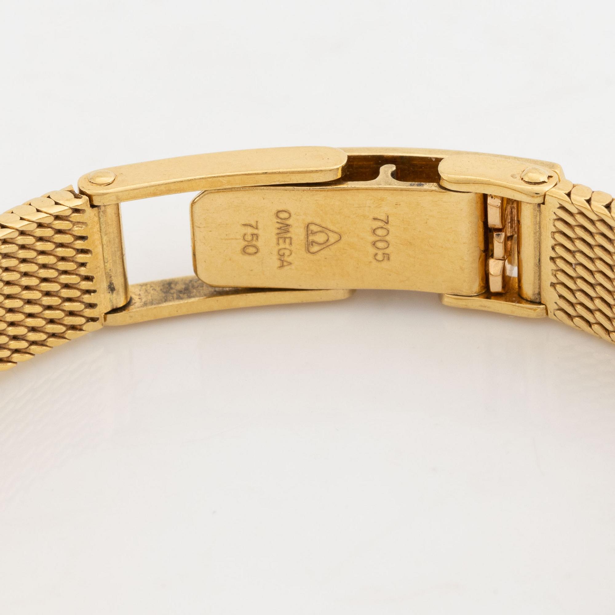 Omega 18K gold ladies watch.