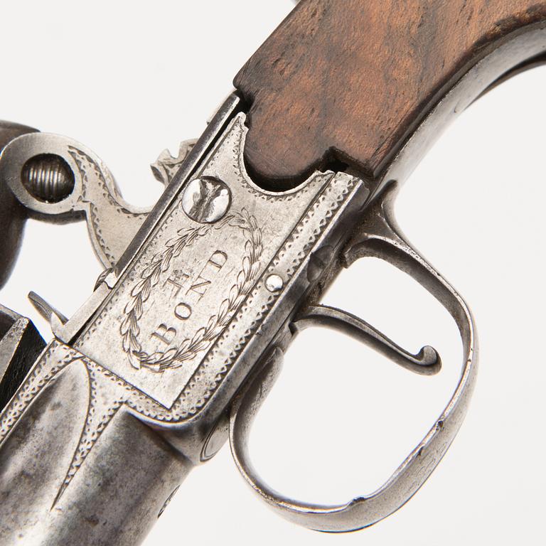 A pair of english boxlock flintock pistols marked E. Bond London, circa 1800.