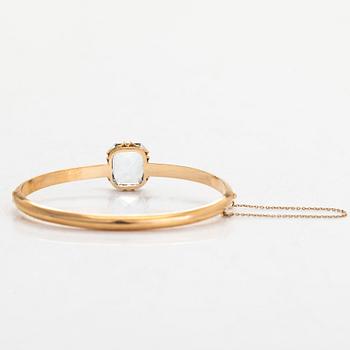 Armring, 18K guld, och akvamarin, Gösta Helenius, Åbo.